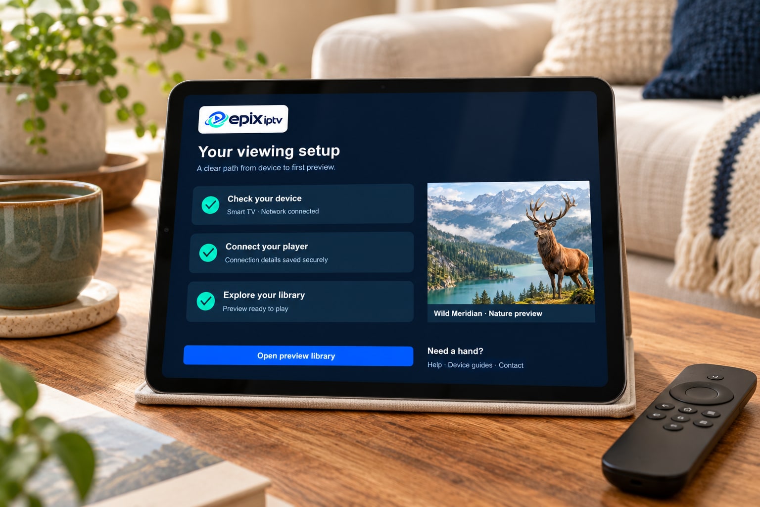 A tablet showing the Epix setup checklist beside a television remote.